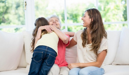 senior-woman-hugging-granddaughter
